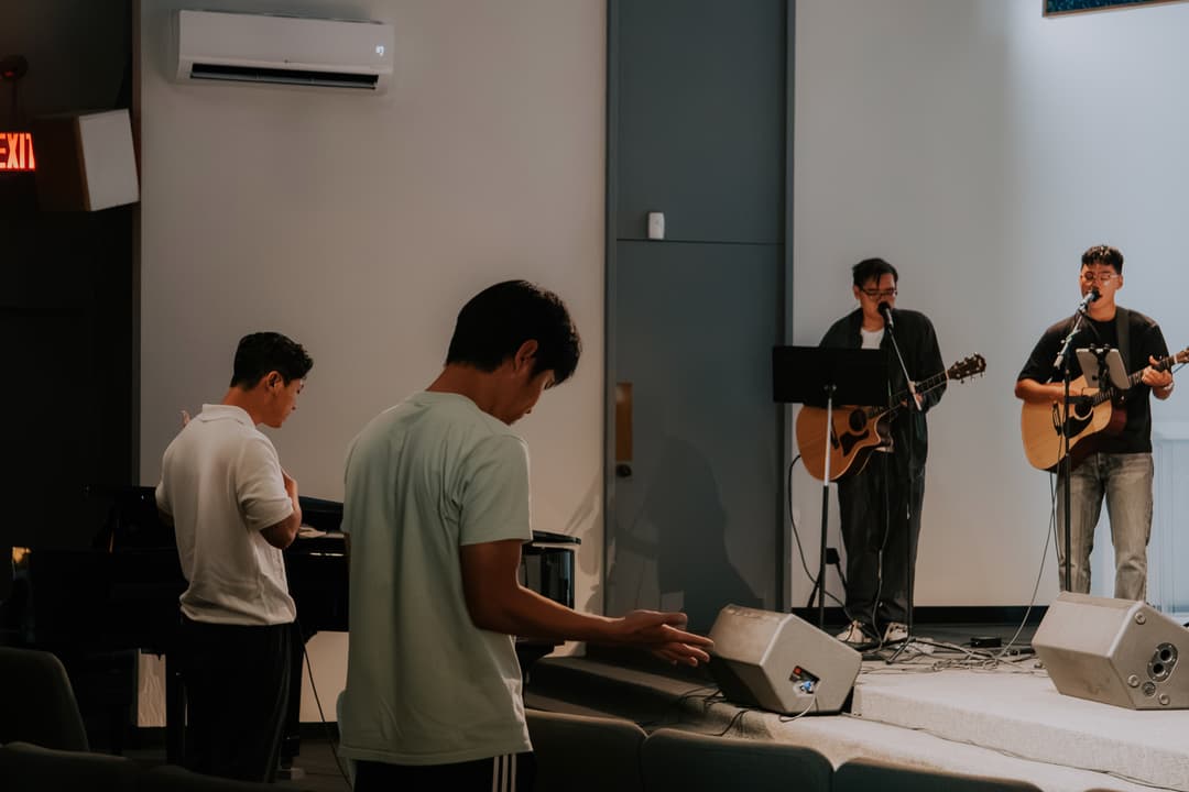 Community members chatting after service